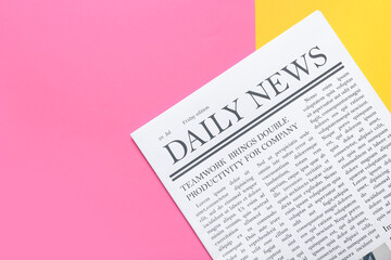Obraz premium Daily newspaper on colorful background