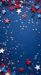 Fototapeta premium Red, white, and blue stars and confetti scattered on a deep blue background, creating a festive and patriotic atmosphere