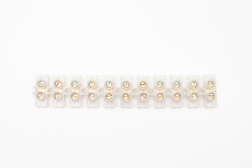 Top view of electrical connector, also known as terminal strip connector or terminal block. Isolated in white background.