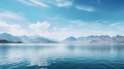 Naklejka premium A vast lake with a background of different mountains. 