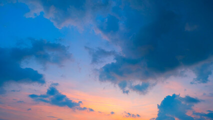 A beautiful sunrise with a mix of vibrant colors. The sky transitions from deep blue to soft pink...