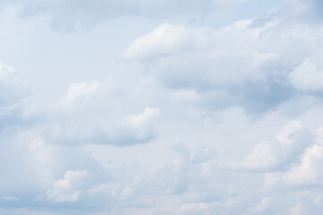 Dense gray thunderstorm cumulus wavy clouds in the whole frame. Gloomy rainy Sky background to overlay on your photos