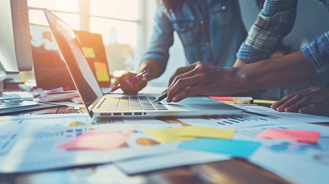 Laptop, planning and meeting with web designer, teamwork and working in development of online marketing. Website, design or group feedback for technology, strategy or creative problem solving