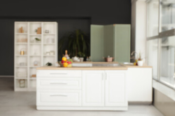 Fototapeta na wymiar Interior of modern stylish kitchen, blurred view
