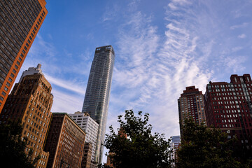 Street Level View of 50 West Street among other Buildings in Lower Manhattan - New York City, USA