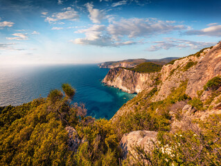 Fantastic summer view of high cliffs on Ionian Sea. Picturesque morning scene of Zakynthos (Zante)...