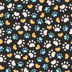 Paw animal print silhouettes. Seamless pattern with paws