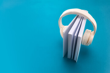 Audio book concept , white book with headphones