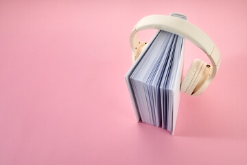 Audio book concept , white book with headphones