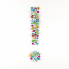 3d render of many colorful medicines and pills in the shape of a exclamation mark on a white background - health care concept.