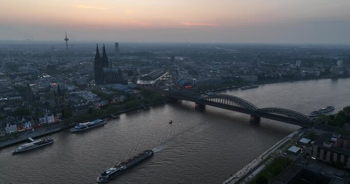 Cologne, north rhine westphalia, Germany, city skyline, cologne cathedral, rhine river, colonius tv tower, severinbrucke bridge and city center at sunset.