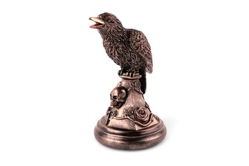 Raven statue isolated on white 