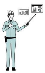 Female engineer in helmet and work wear analyzing a performance graph.