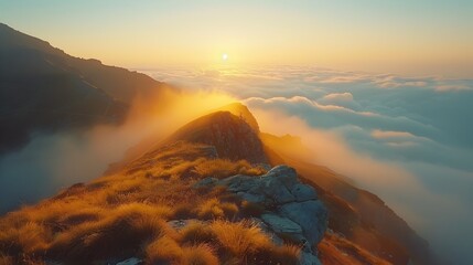 Fototapeta premium Mystical Mountain Ridgeline Shrouded in Ethereal Fog at Dawn