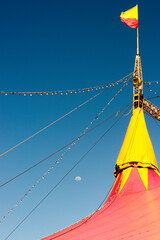 Detail of a circus tent with the sky in the background