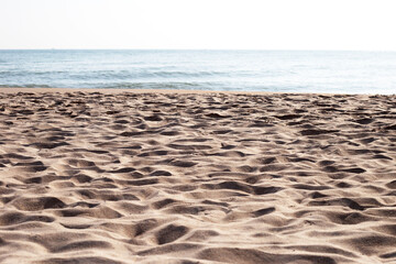 Sand beach with sea and sky. Holiday summer beach