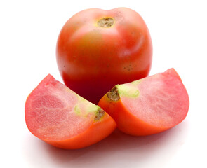 Fresh red ripe tomatoes against white background - stock photo
