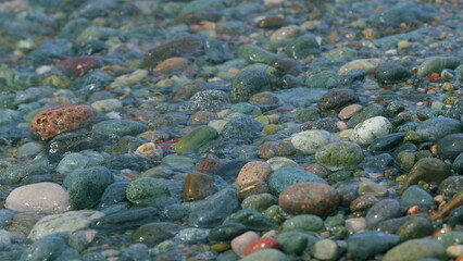 Sea Pebbles Background. Pebbles And Water On The Sea Shore. Ocean Vacation.