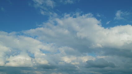 Obraz premium Motions Clouds Puffy Fluffy White Clouds Sky. Potential For Natural Or Climate Projects.