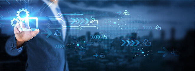 Hand touching global network connection on a computer, displaying technological and futuristic elements, symbolizing advancements in computer engineering and connectivity.