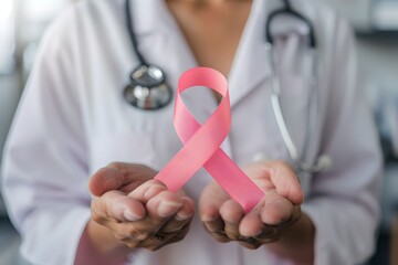 Doctor holding a pink ribbon symbolizing breast cancer awareness. Conceptual image for health campaigns. High-quality AI-generated picture. Ideal for medical content. Generative AI - Powered by Adobe