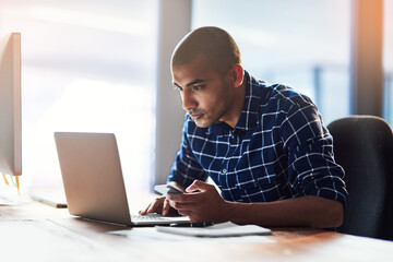 Employee, man and laptop in office for internet search, information and creativity. Reading,...