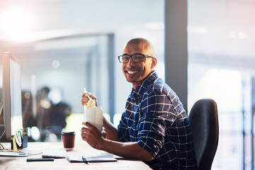 Fast food, office and business man on computer for planning, working and productivity on startup project. Portrait of happy and creative worker or graphic designer eating ramen, noodles or takeout