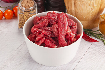 Raw beef meat - sliced strips