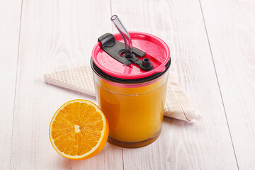 Sweet fresh orange juice in the glass