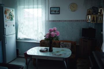 a vase of flowers on the table