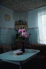 a vase of flowers on the table