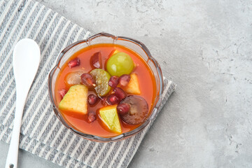Asinan Buah (pickled fruit), Indonesian dessert made from preserved tropical fruits. Spicy, sweet and sour taste.
