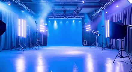 Blue-walled professional photo studio with lighting equipment and white floor. Concept Professional Studio, Blue Walls, Lighting Equipment, White Floor