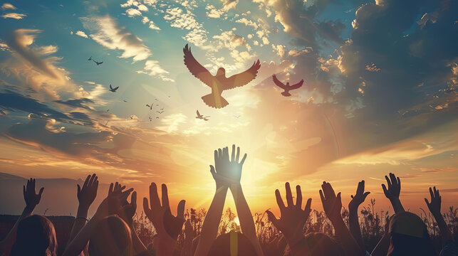 September 21 is the International Day of Peace. Silhouettes of a group of people stretching their hands up to a dove of peace floating in the sky at sunrise - Powered by Adobe
