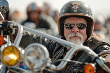 Closeup photo of a focused man wearing a vintage helmet at a motorcycle rally with other participants blurred in the background