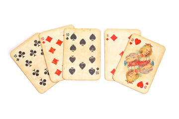 Three of a Kind poker vintage playing cards isolated on completely white background