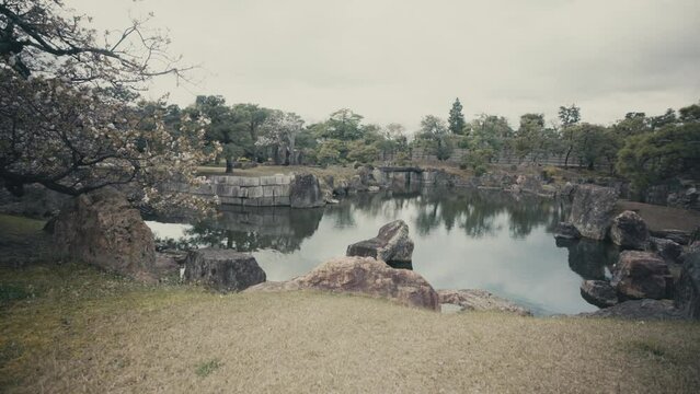 Tranquil Nature View Of Garden Nearby The Nijo Castle At Ninomaru Palace In Kyoto, Japan. wide shot