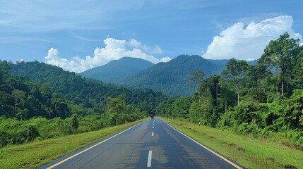 Naklejka premium Empty road with mountains in background