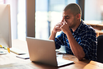 Business man, stress and headache on laptop in office for news, mistake or error with startup...