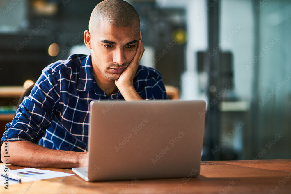 Aufkleber Business man, bored and tired on computer for decision, solution or problem solving in office at night. Sad and serious accountant with fatigue or stress reading online report on laptop at startup