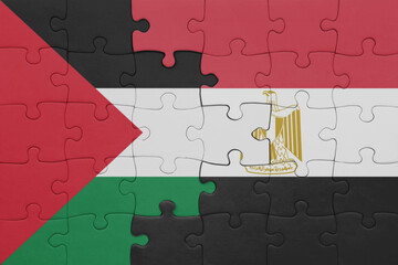 puzzle with the colourful national flag of egypt and flag of palestine.