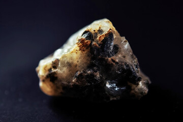 Samuelsonite is rare precious natural stone on black background. AI generated. Header banner mockup with space.