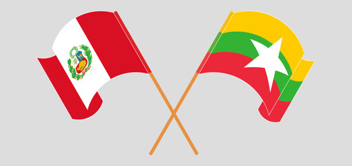 Crossed and waving flags of Peru and Myanmar