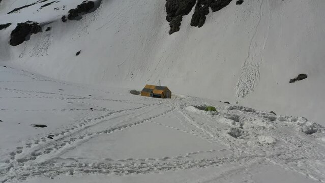 Glaciologists' house in the snow at the foothills of Belukha Mountain. 
