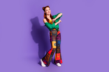 Full length photo of cheerful lovely girl wear print trousers stylish shirt dancing on discotheque...