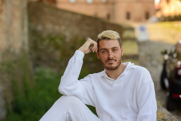 Young man posing in urban background