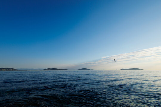 Sunset over the sea at the view of islands of Istanbul