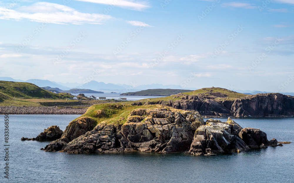 Poster The rocky coastline and blue water of Camas Eilean Ghlais with distant views of Reiff on a coastal walk in the Scottish Highlands on a sunny summers day in the UK.