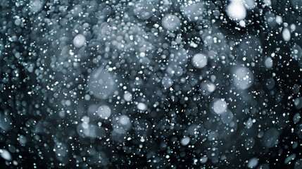 Obraz premium Blurry raindrops and fog on a dark background