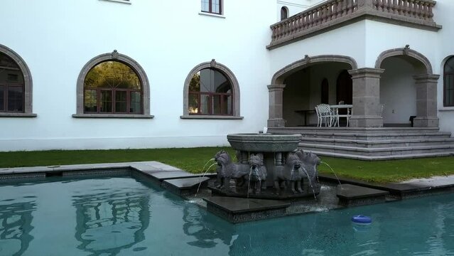 Mexico city reforma lomas house, drone shot, fountain backgraound